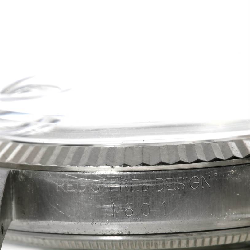 This image shows a close-up side view of the casing and bezel with the model number of the Vintage Collection Rolex watch.
