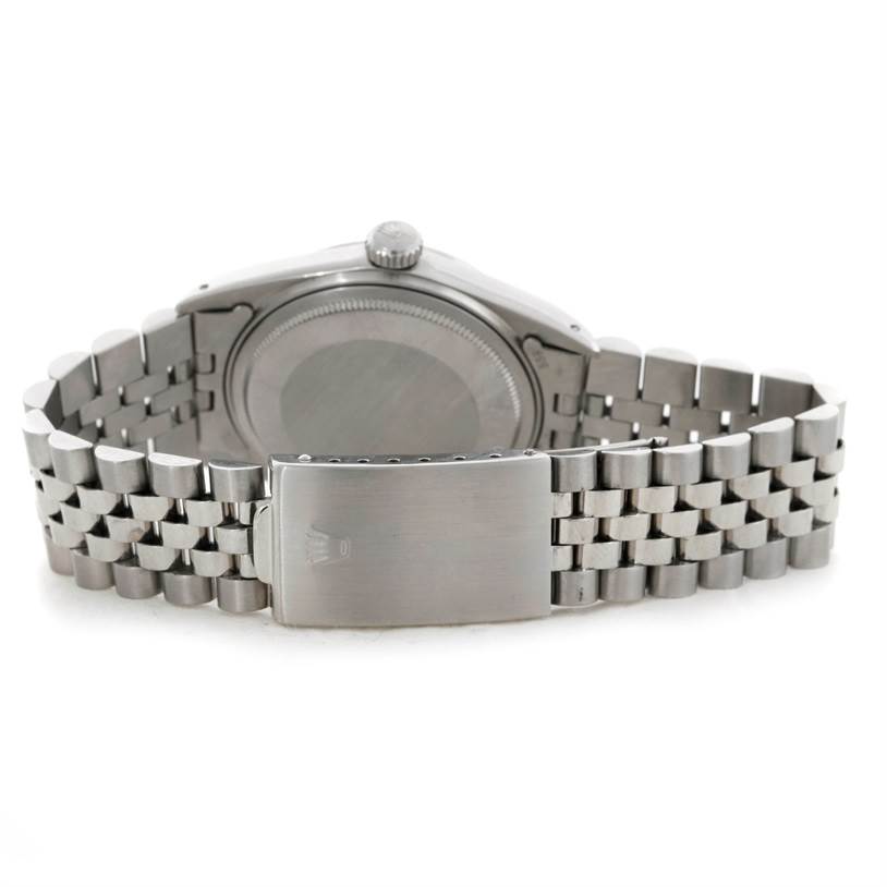 This image shows the back case and clasp of a Vintage Collection model watch by Rolex.