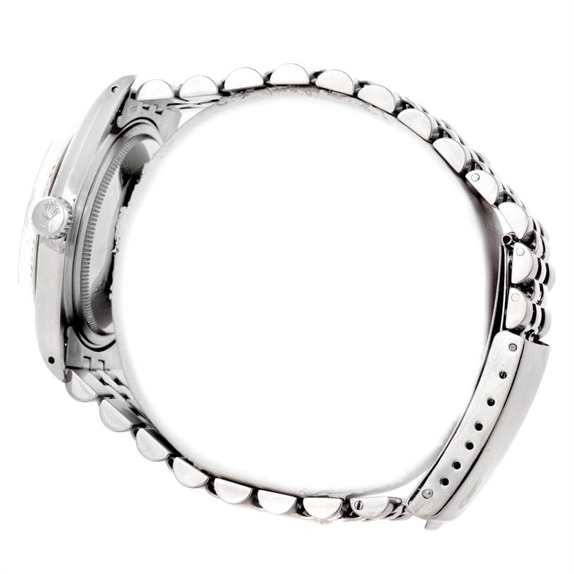 This image shows the side view of a Vintage Collection Rolex watch, focusing on the crown, case, and bracelet.