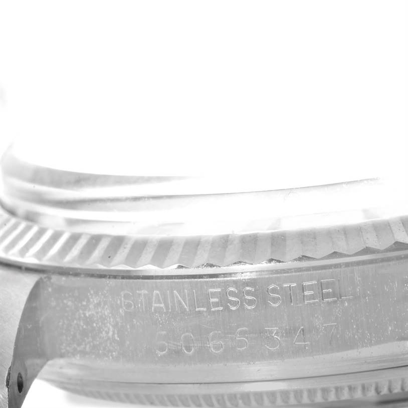 The image shows a close-up of the side of the Rolex Vintage Collection 1601 Men's Stainless Steel Silver Dial 1601 Men's Stainless Steel Silver Dial watch, displaying "STAINLESS STEEL 5065347."