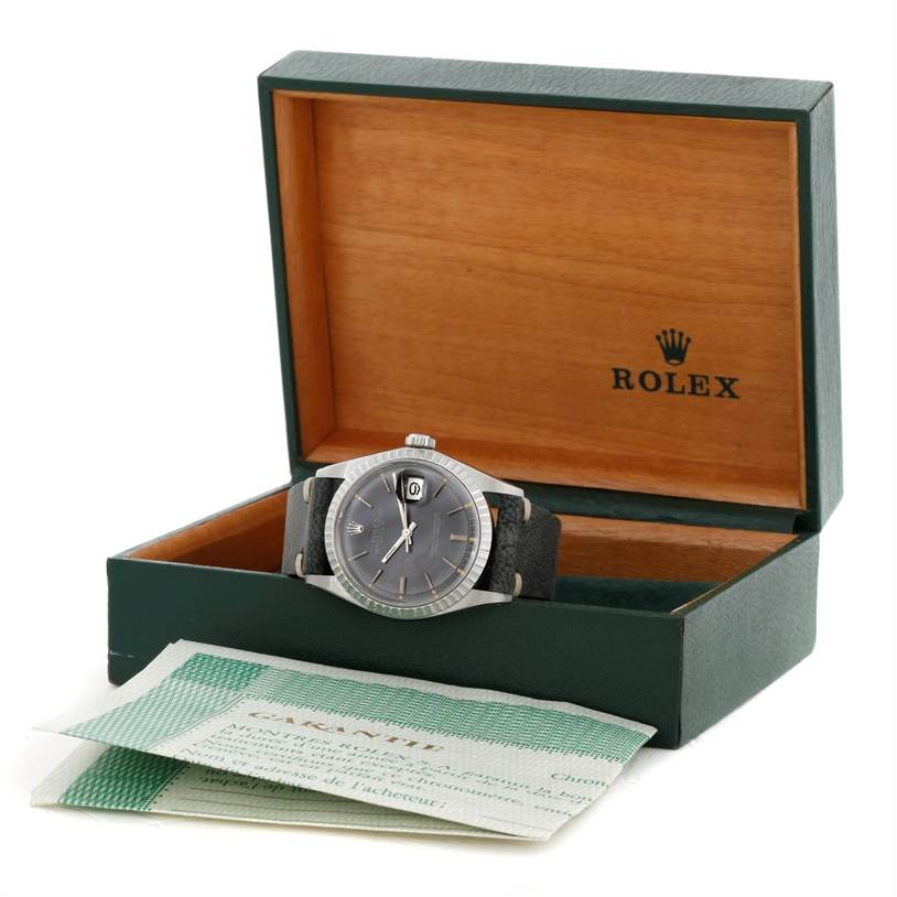 The image shows a Rolex Vintage Collection 1603 Men's Stainless Steel Grey Dial 1603 Men's Stainless Steel Grey Dial watch in its open box with accompanying papers.