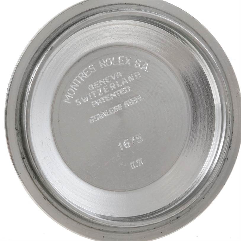 The image shows the inside case back of a Vintage Collection model by Rolex, featuring engraved brand and manufacturing information.