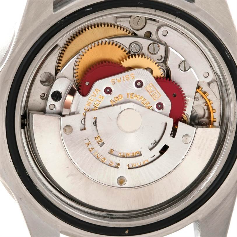 The image shows the inner mechanical movement of the Rolex Vintage Collection 1675 Men's Stainless Steel Black Dial 1675 Men's Stainless Steel Black Dial model, focusing on the intricate gears and components.