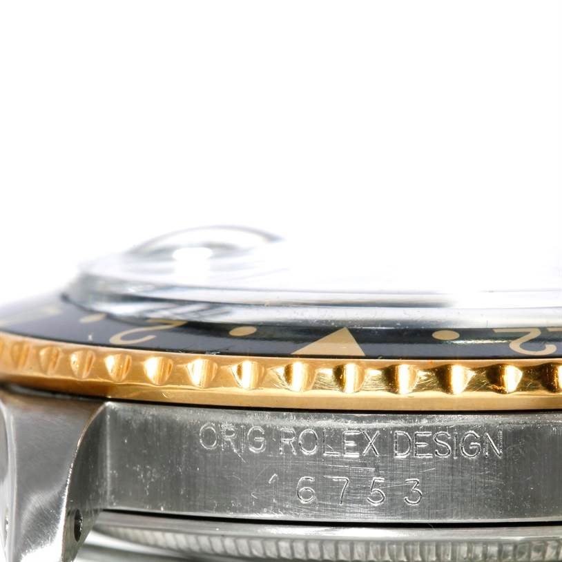 The image shows a close-up side view of a Vintage Collection model Rolex watch, highlighting its bezel, case, and model number.