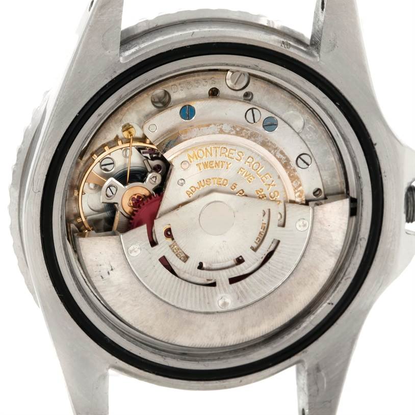 The image shows the inner mechanism of a Rolex Vintage Collection 1675 Men's Stainless Steel Black Dial 1675 Men's Stainless Steel Black Dial model watch from the back angle.
