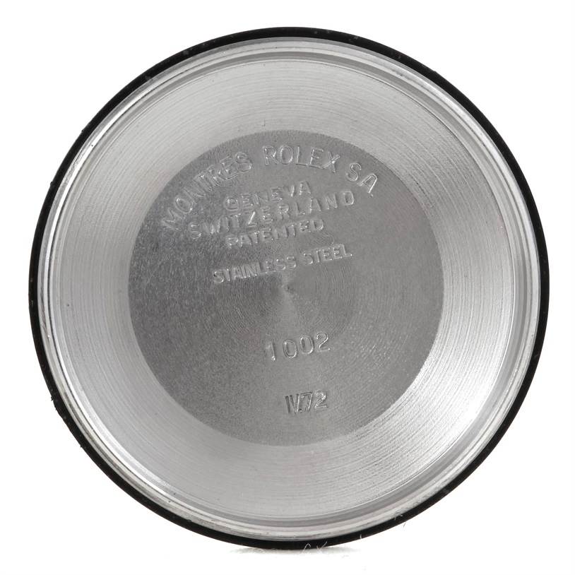 This image shows the interior of the case back of a Vintage Collection watch by Rolex.