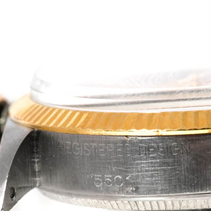Close-up angle of the side of a Vintage Collection Rolex watch, showing the bezel and part of the case with model number 5501.