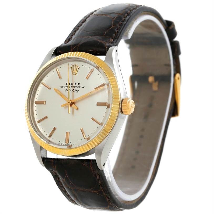 The Rolex Vintage Collection 5501 Men's Steel and Gold (two tone) Silver Dial 5501 Men's Steel and Gold (two tone) Silver Dial model is shown at an angled view, highlighting its dial, bezel, crown, and leather strap.