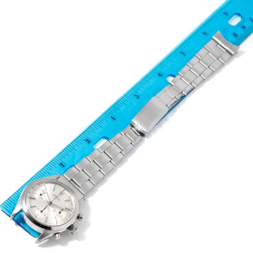 The image shows a Vintage Collection Rolex watch with a metal bracelet, placed next to a ruler for scale.