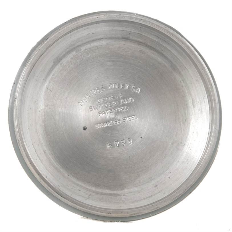 This image shows the inside case back of the Vintage Collection model by Rolex, highlighting markings and material details.