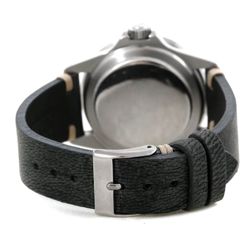 This image showcases the back view of a Rolex Vintage Collection 1680 Men's Stainless Steel Black Dial 1680 Men's Stainless Steel Black Dial watch, highlighting the clasp and leather strap.