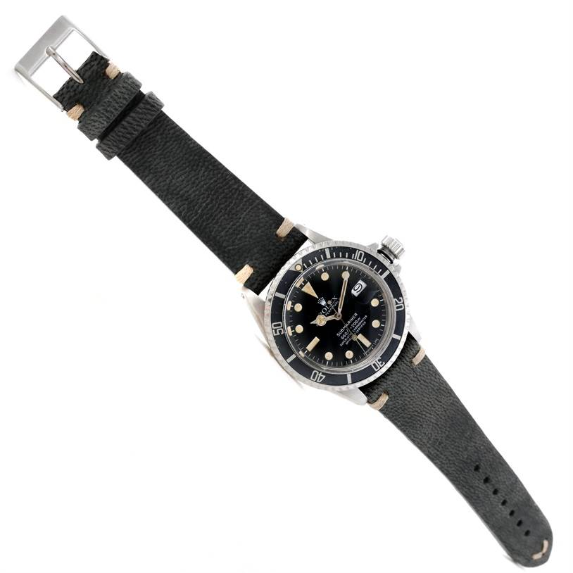 The angle shows a top-down view of the Rolex Vintage Collection 1680 Men's Stainless Steel Black Dial 1680 Men's Stainless Steel Black Dial watch, displaying the face and black leather strap.