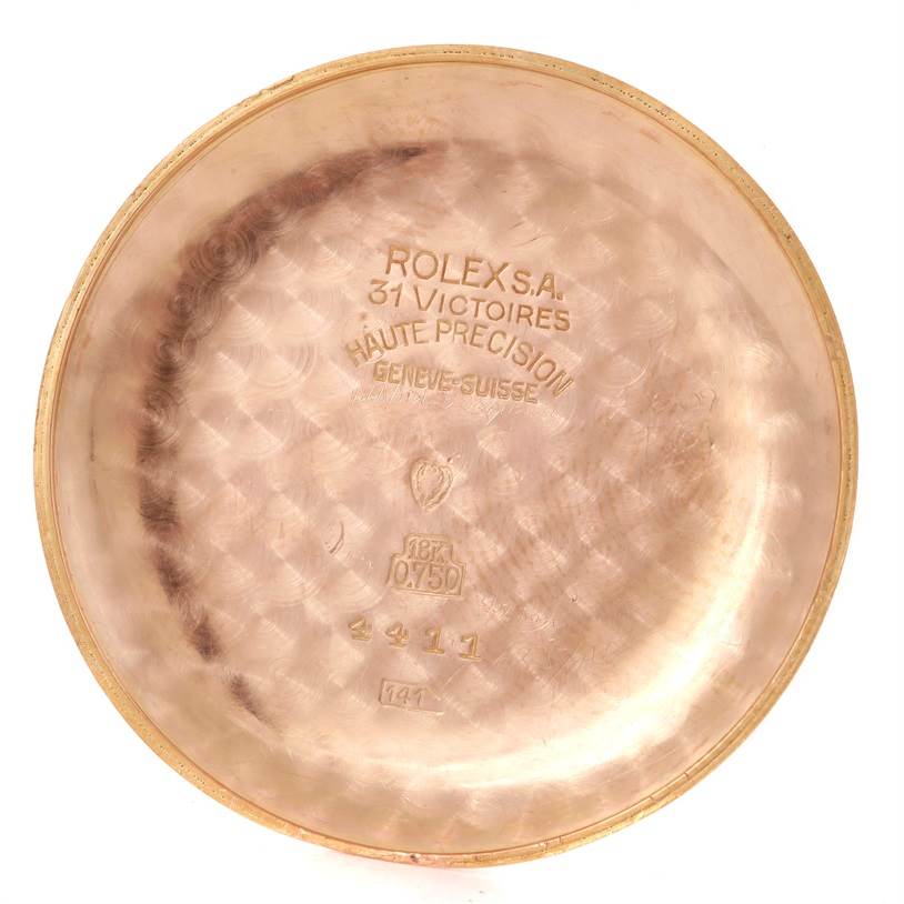 This image shows the inside of the back cover of a Vintage Collection Rolex watch, engraved with specifications and identifiers.