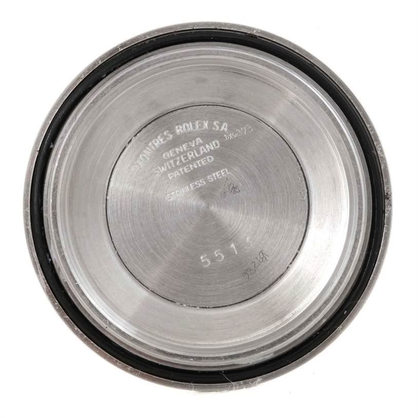 This image shows the inner case back of the Vintage Collection Rolex watch with model details and branding engraved.