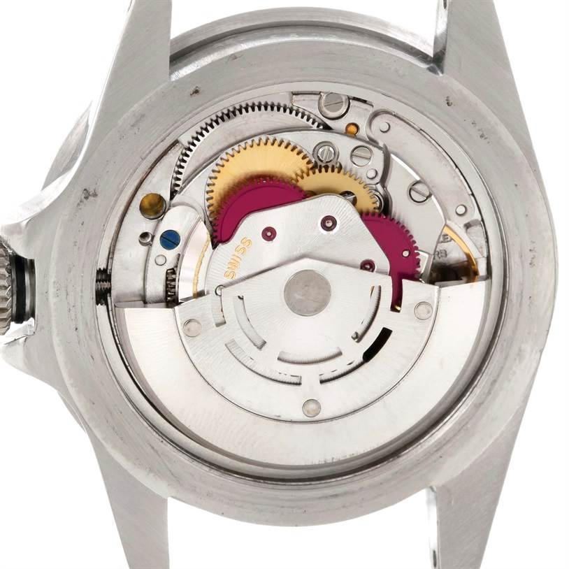 The image shows the internal mechanism of the Rolex Vintage Collection 5513 Men's Stainless Steel Black Dial 5513 Men's Stainless Steel Black Dial watch from the back, highlighting gears and components.