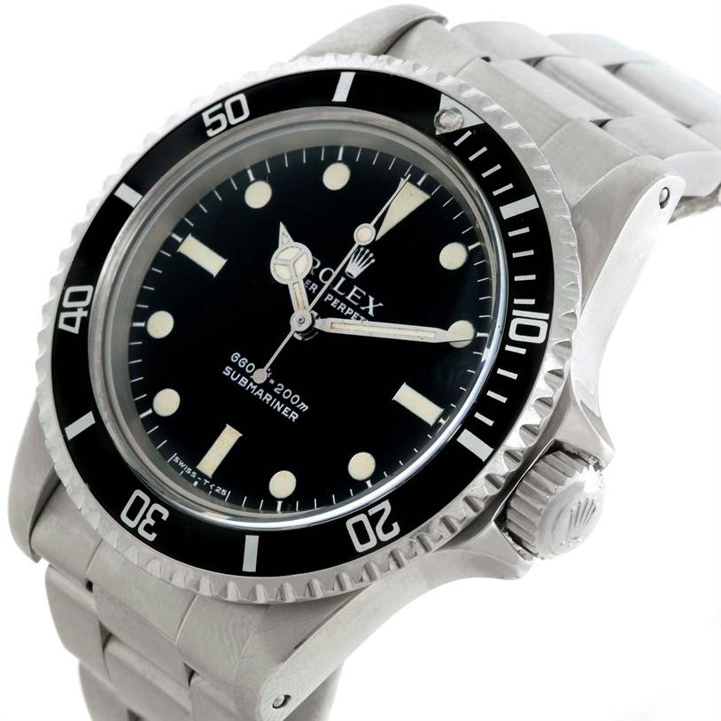 The image shows a Rolex Vintage Collection 5513 Men's Stainless Steel Black Dial 5513 Men's Stainless Steel Black Dial Submariner watch at a three-quarter angle, highlighting the dial, bezel, crown, and part of the bracelet.