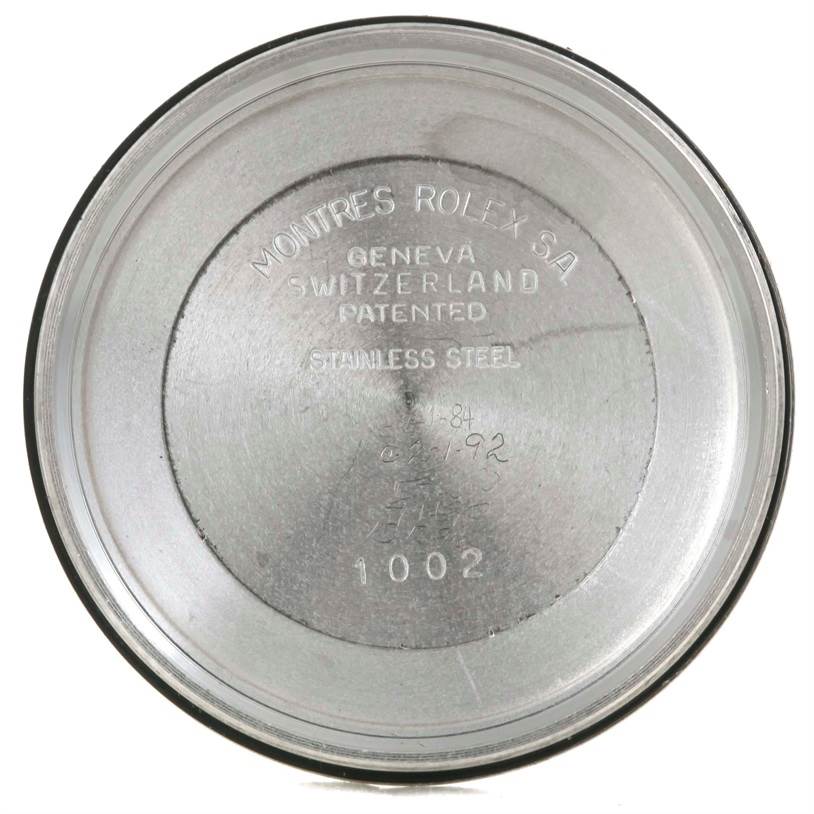 This image shows the inside of the case back of a Vintage Collection model watch by Rolex.