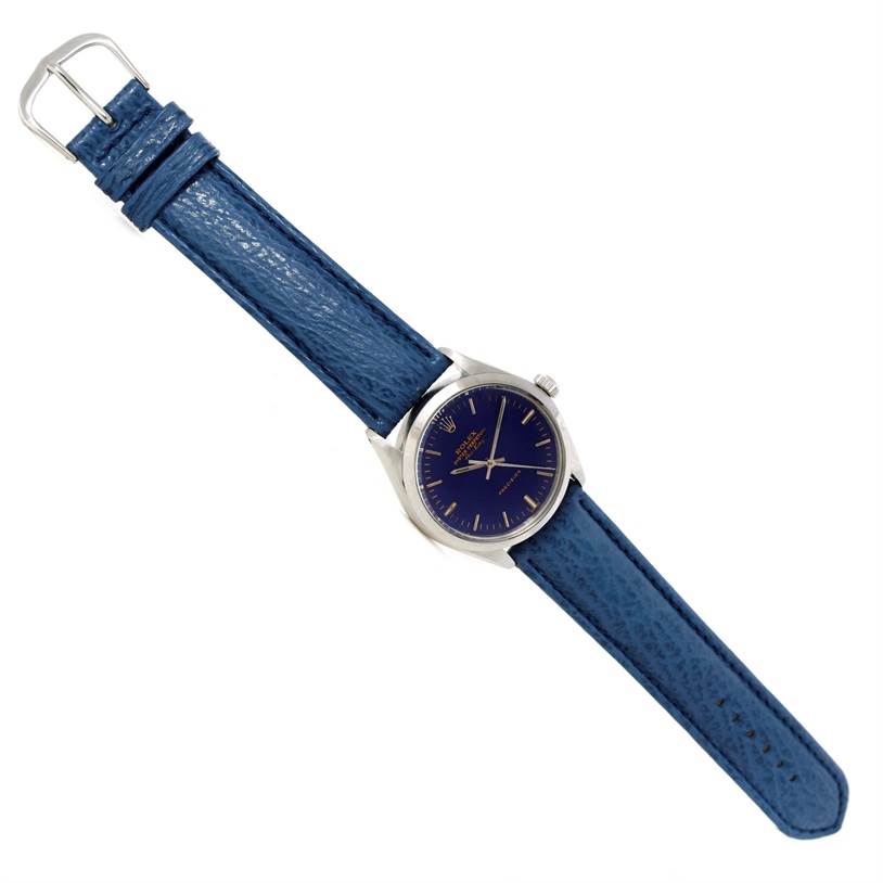 The Rolex Vintage Collection 5500 Men's Stainless Steel Blue Dial 5500 Men's Stainless Steel Blue Dial model is shown from a top-down angle with its blue leather strap and dark blue dial visible.