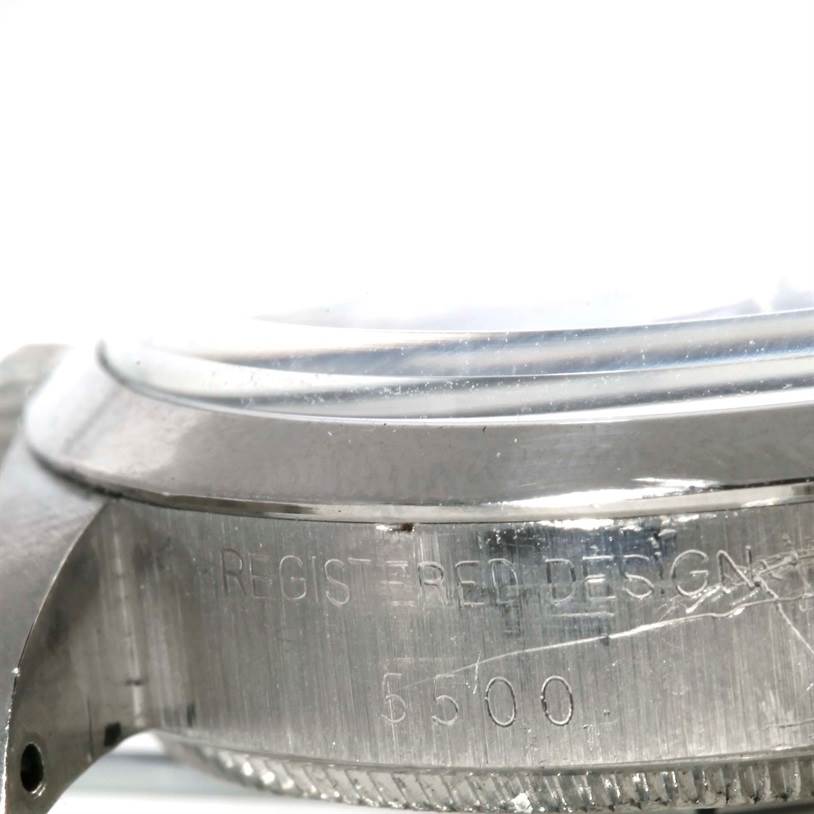 The image shows a close-up side view of the casing and bezel of a Rolex Vintage Collection 5500 Men's Stainless Steel Blue Dial 5500 Men's Stainless Steel Blue Dial model 5500.