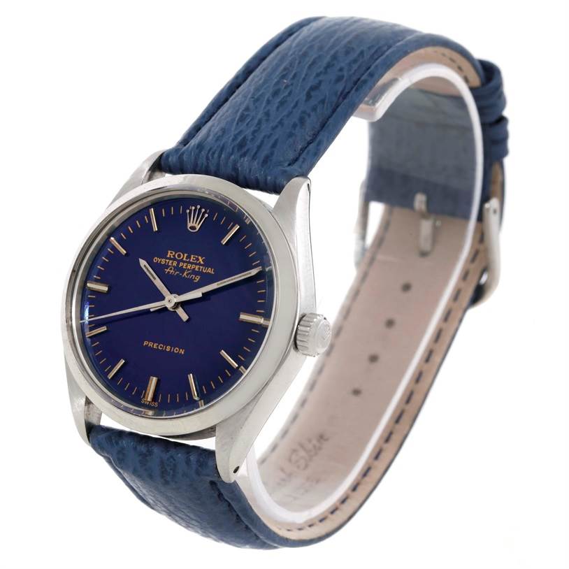 The image shows a Rolex Vintage Collection 5500 Men's Stainless Steel Blue Dial 5500 Men's Stainless Steel Blue Dial model watch from a frontal and slight side angle, highlighting the case, dial, crown, and blue strap.