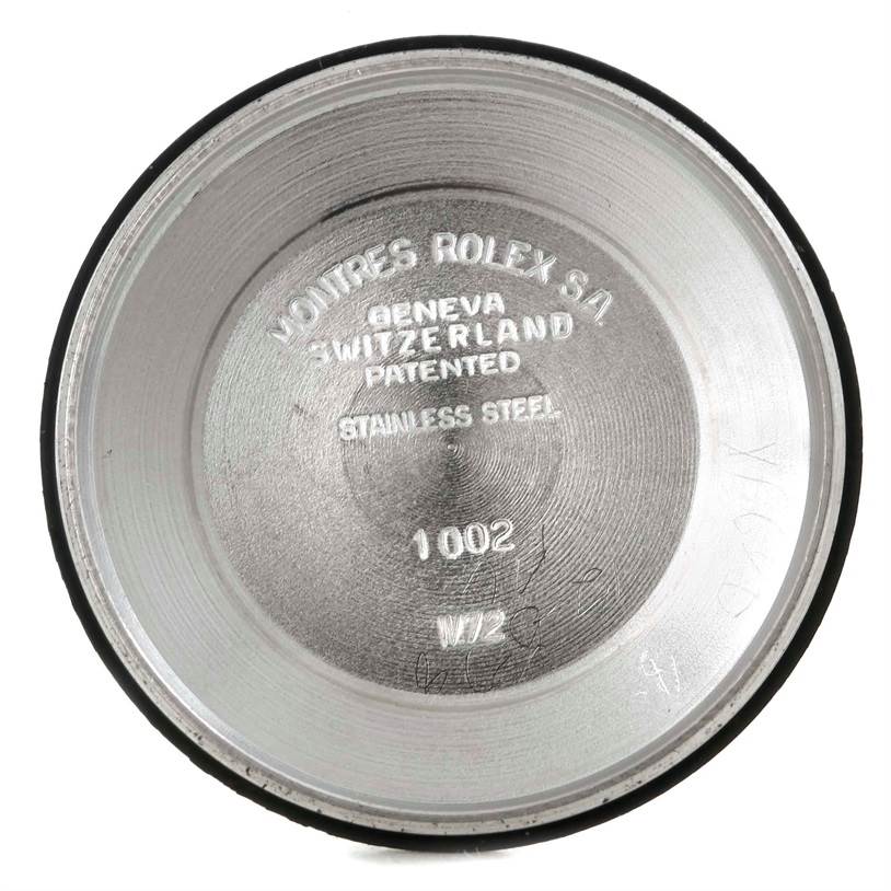 The image shows the inner case back of a Rolex Vintage Collection 5501 Men's Steel and Gold (two tone) Silver Dial 5501 Men's Steel and Gold (two tone) Silver Dial watch in a direct top-down angle.