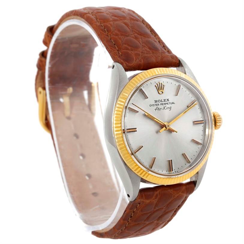 The image shows a side angle of the Rolex Vintage Collection 5501 Men's Steel and Gold (two tone) Silver Dial 5501 Men's Steel and Gold (two tone) Silver Dial model with a brown leather strap.