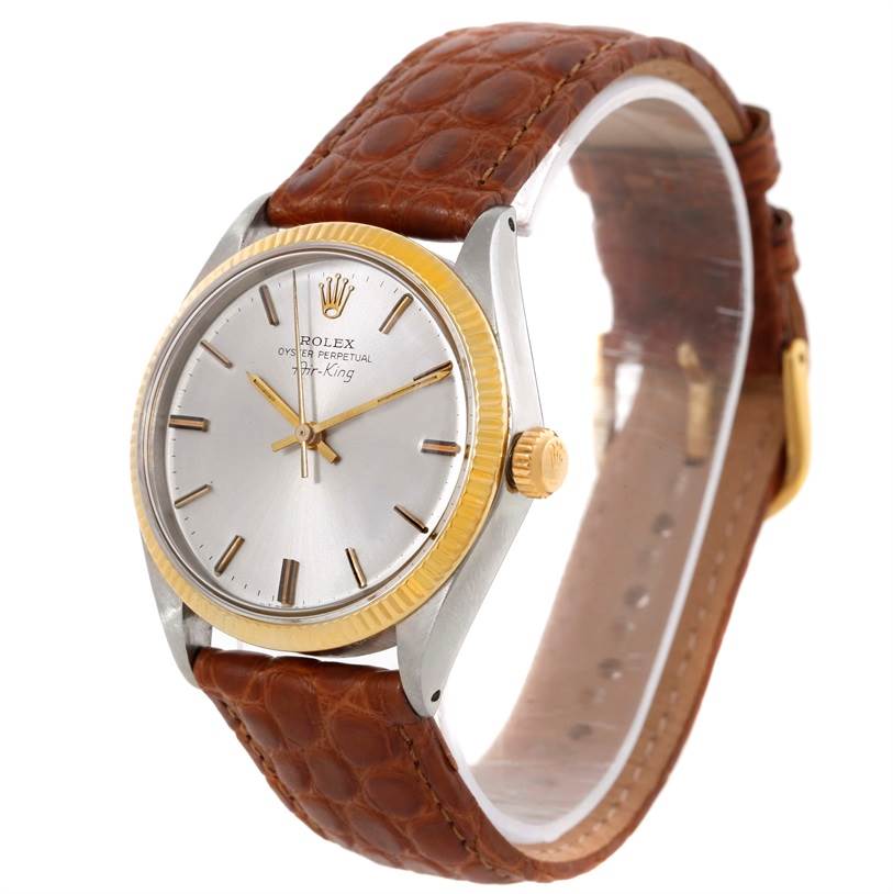 The Rolex Vintage Collection 5501 Men's Steel and Gold (two tone) Silver Dial 5501 Men's Steel and Gold (two tone) Silver Dial watch is shown at an angled front view, highlighting the dial, bezel, crown, and leather strap.