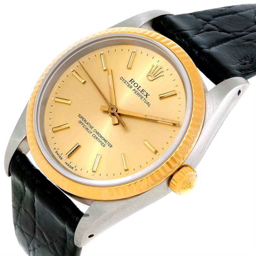 This image shows a close-up angle of the Rolex Vintage Collection 14203 Men's Steel and Gold (two tone) Champagne Dial 14203 Men's Steel and Gold (two tone) Champagne Dial model, highlighting its dial, bezel, and strap.