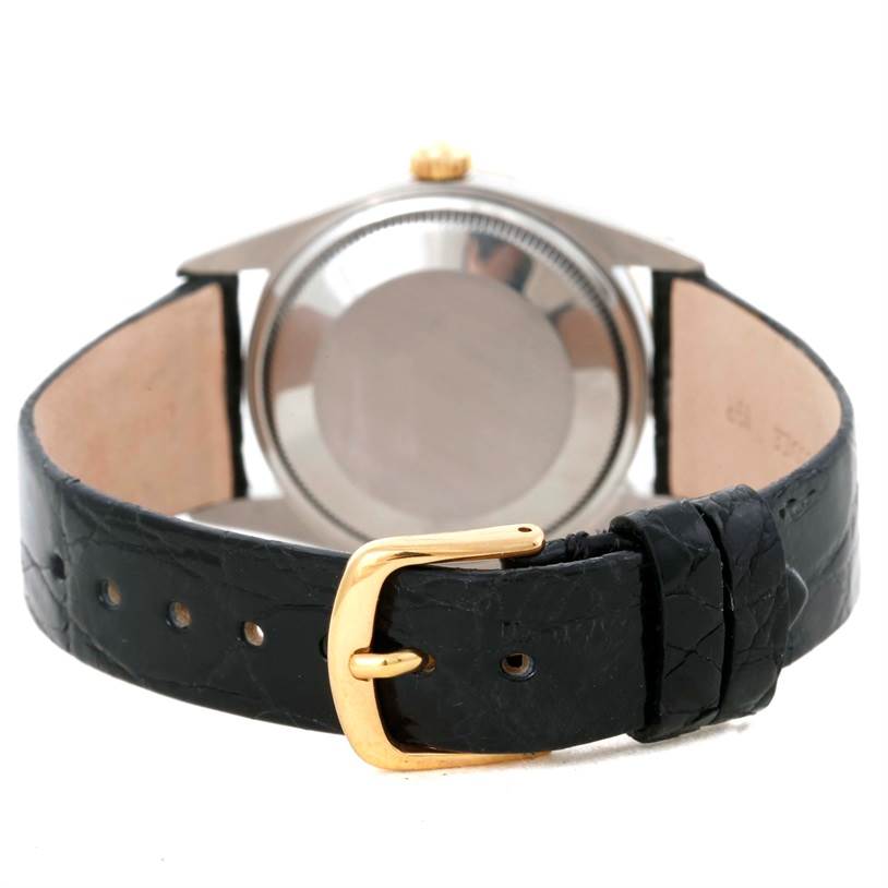 This image shows the back case and clasp of a Rolex Vintage Collection 14203 Men's Steel and Gold (two tone) Champagne Dial 14203 Men's Steel and Gold (two tone) Champagne Dial watch, viewed from a rear angle.