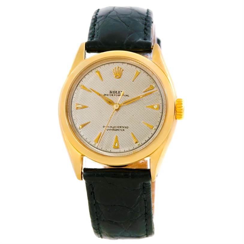 The image shows a front view of the Rolex Vintage Collection 6084 Men's Yellow Gold Silver Dial 6084 Men's Yellow Gold Silver Dial model, including the dial, hands, case, and strap.