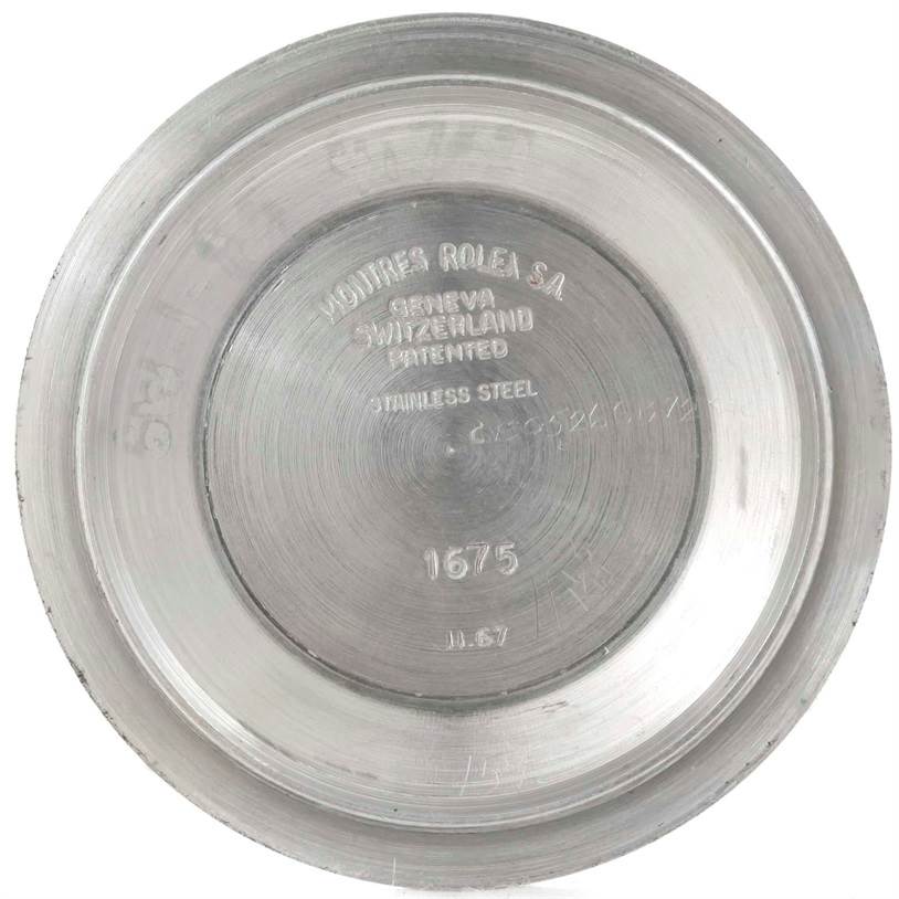 This is the interior view of the case back for the Vintage Collection model by Rolex, showing engraved details.