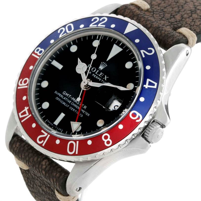 The image shows a Rolex Vintage Collection 1675 Men's Stainless Steel Black Dial 1675 Men's Stainless Steel Black Dial GMT-Master watch from an angled close-up view, highlighting its bezel, dial, and crown.