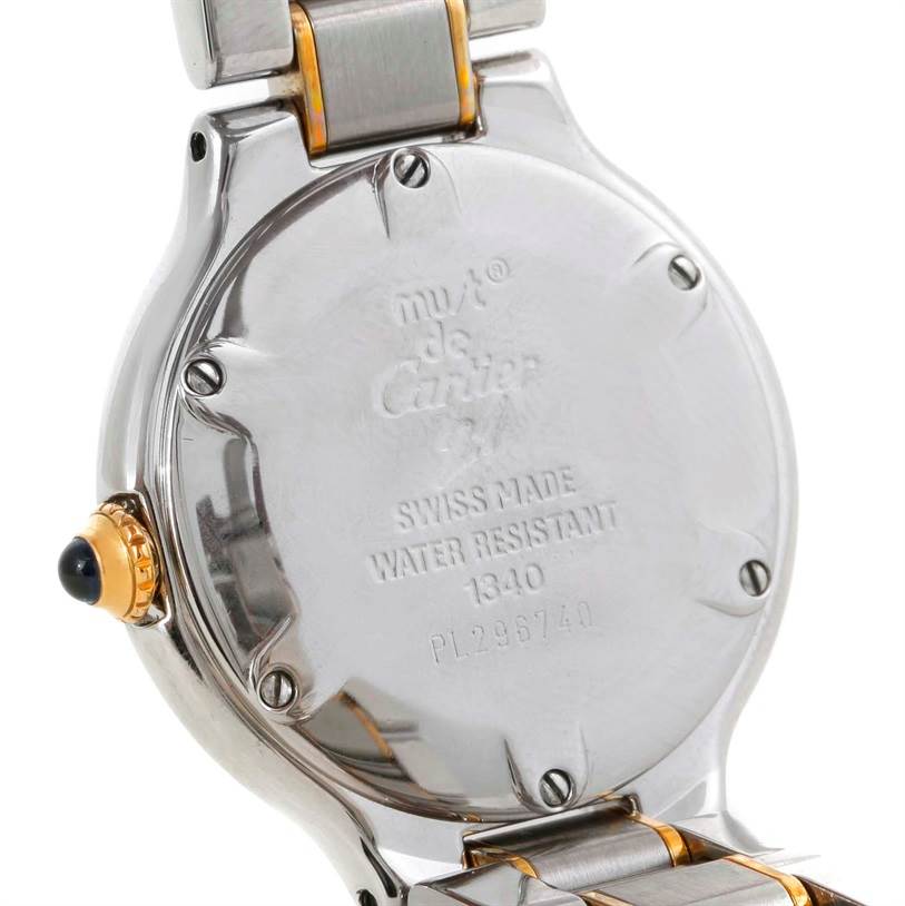 The image shows the back case and part of the bracelet of a Cartier Must 21 W10073R6 Women
s Stainless Steel Silver Dial W10073R6 Women
s Stainless Steel Silver Dial model watch, highlighting its water-resistance and Swiss-made markings.