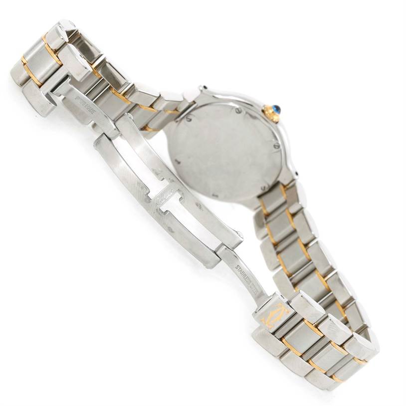 The image shows the back and clasp of the Cartier Must 21 W10073R6 Women
s Stainless Steel Silver Dial W10073R6 Women
s Stainless Steel Silver Dial model watch, highlighting its metal band and deployment clasp.