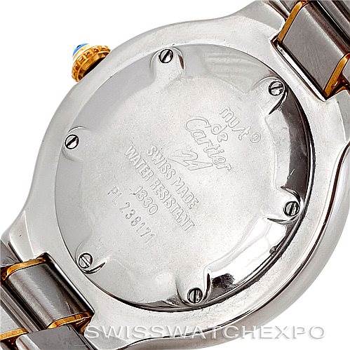 The image shows the case back of the Cartier Must 21 W10073R6 Men's Stainless Steel Silver Dial W10073R6 Men's Stainless Steel Silver Dial watch, highlighting the engraved details and part of the bracelet.