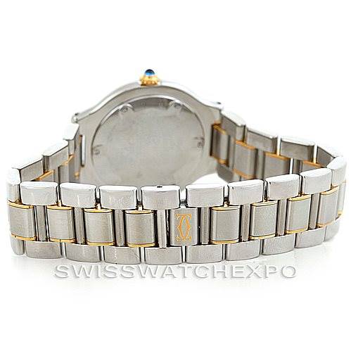 The image shows the Must 21 by Cartier watch from the back, highlighting its metal bracelet and clasp.