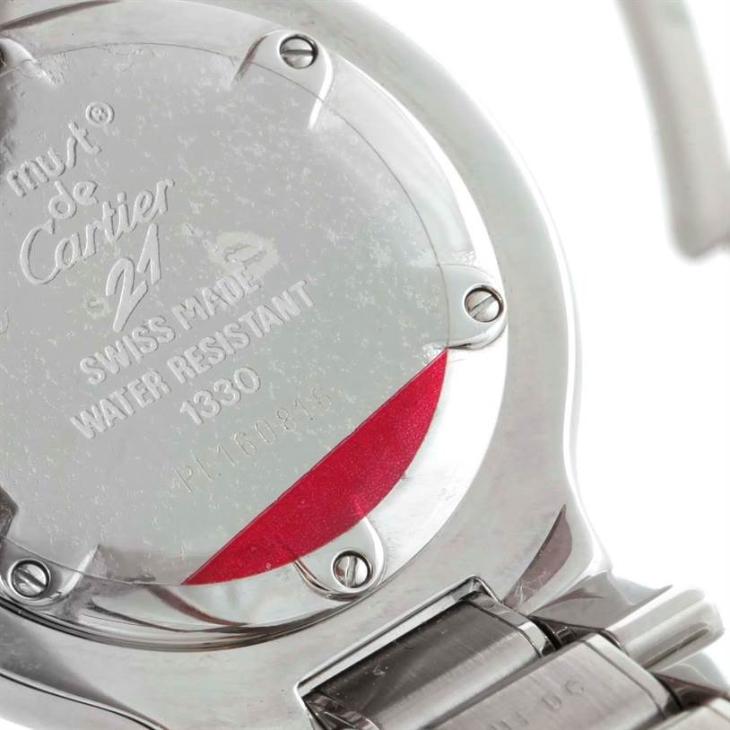 The image shows the back case of the Cartier Must 21 W10109T2 Women's Stainless Steel Silver Dial W10109T2 Women's Stainless Steel Silver Dial watch, highlighting its inscriptions and stainless steel bracelet.