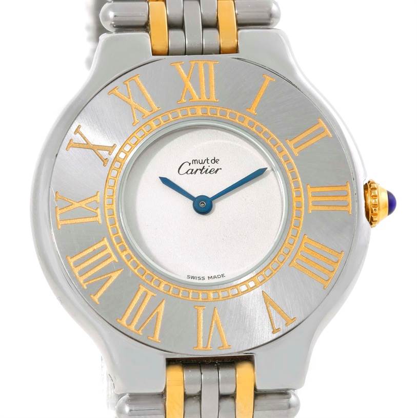 The image shows the face and partial bracelet of a Cartier Must 21 W10073R6 Women's Stainless Steel Silver Dial W10073R6 Women's Stainless Steel Silver Dial watch at a straight-on angle.