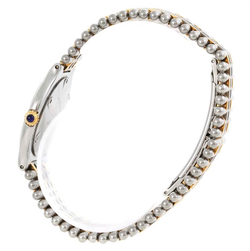 The image shows a side view of the Cartier Must 21 W10073R6 Women's Stainless Steel Silver Dial W10073R6 Women's Stainless Steel Silver Dial watch, highlighting its bracelet and bezel details.