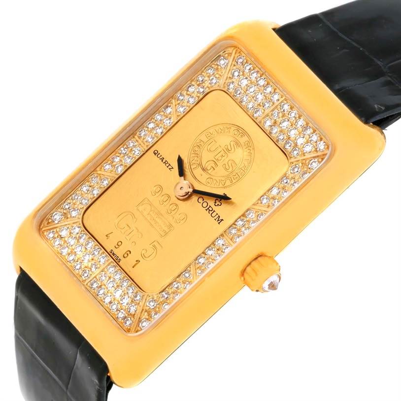 The image shows a Corum Women's Yellow Gold Champagne Dial Women's Yellow Gold Champagne Dial 18K Yellow Gold Diamond 5 Gram Ingot 999.9 Watch viewed from the top, displaying the watch face and strap.