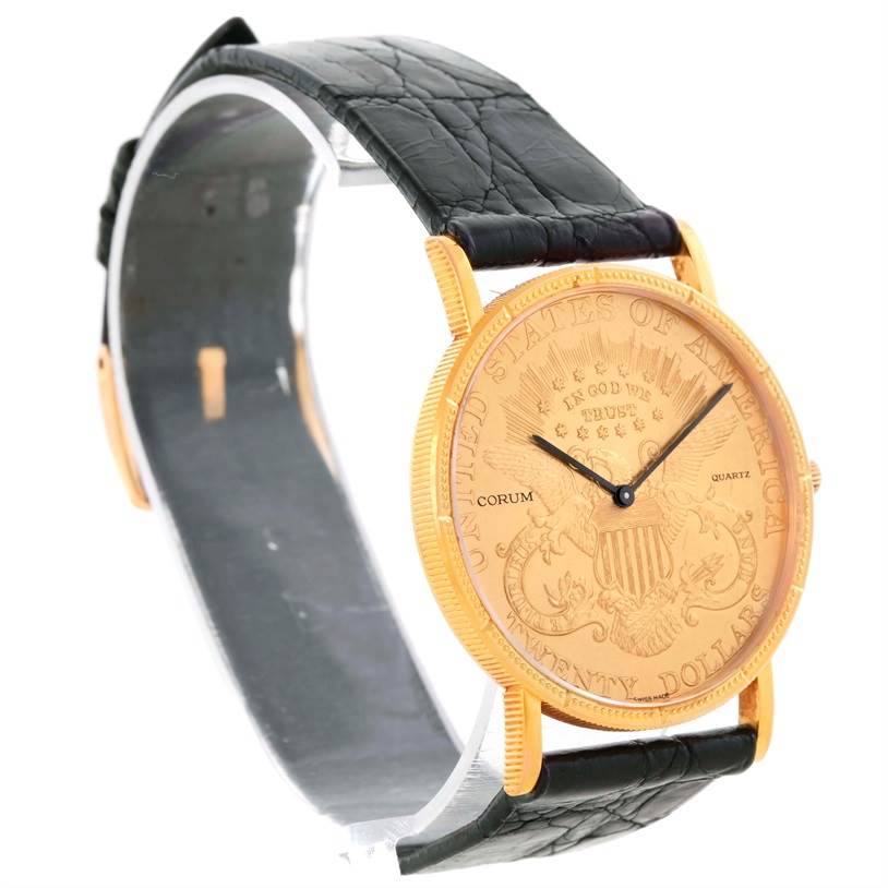 The image shows a side angle of the Corum Coin Watch Men
s Yellow Gold Black Dial Men
s Yellow Gold Black Dial model, highlighting the watch face, case, and part of the black leather strap.
