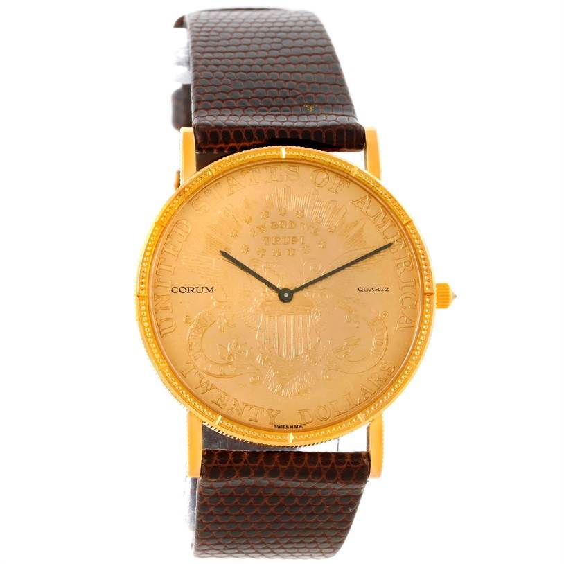 The Corum Yellow Gold Black Dial Yellow Gold Black Dial 20 Dollars Double Eagle Yellow Gold Coin Brown Strap Watch is shown from the front, displaying its entire face and strap.