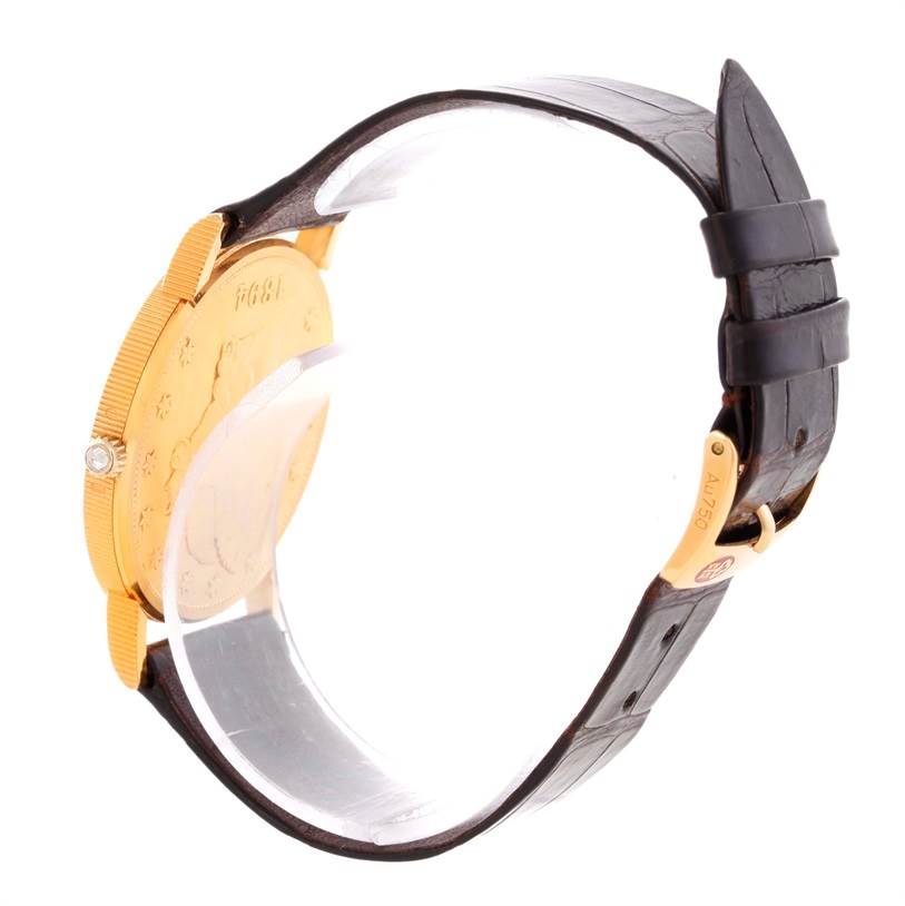 This image shows a side angle of the Corum Coin Watch Men's Yellow Gold Black Dial Men's Yellow Gold Black Dial, highlighting its golden case and black leather strap.