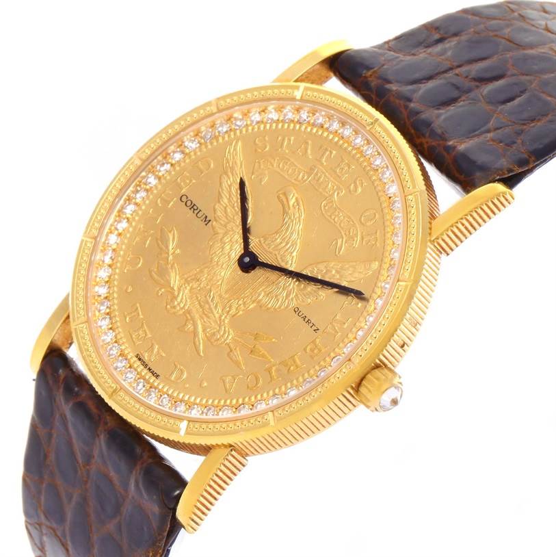 The image shows a front-side view of the Corum Yellow Gold Black Dial Yellow Gold Black Dial 1893 18K Yellow Gold 10 Coin Diamond Watch, highlighting the watch face and leather strap.