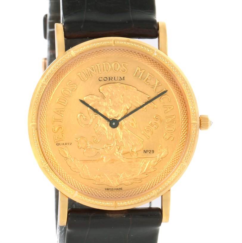 This image shows a front view of the Corum Coin Watch Men's Yellow Gold Champagne Dial Men's Yellow Gold Champagne Dial model, displaying its face and part of the black strap.