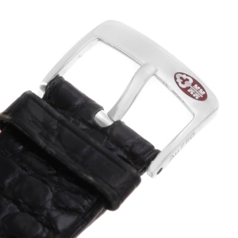 This image shows the buckle and strap of a Corum Men's White Gold White Dial Men's White Gold White Dial Celebrates Second Millennium 18K White Gold Automatic LTD Watch.