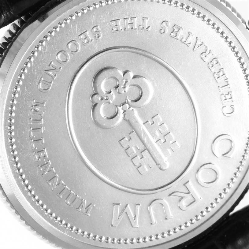 The image shows the case back of the Corum Men's White Gold White Dial Men's White Gold White Dial Celebrates Second Millennium 18K White Gold Automatic LTD Watch.