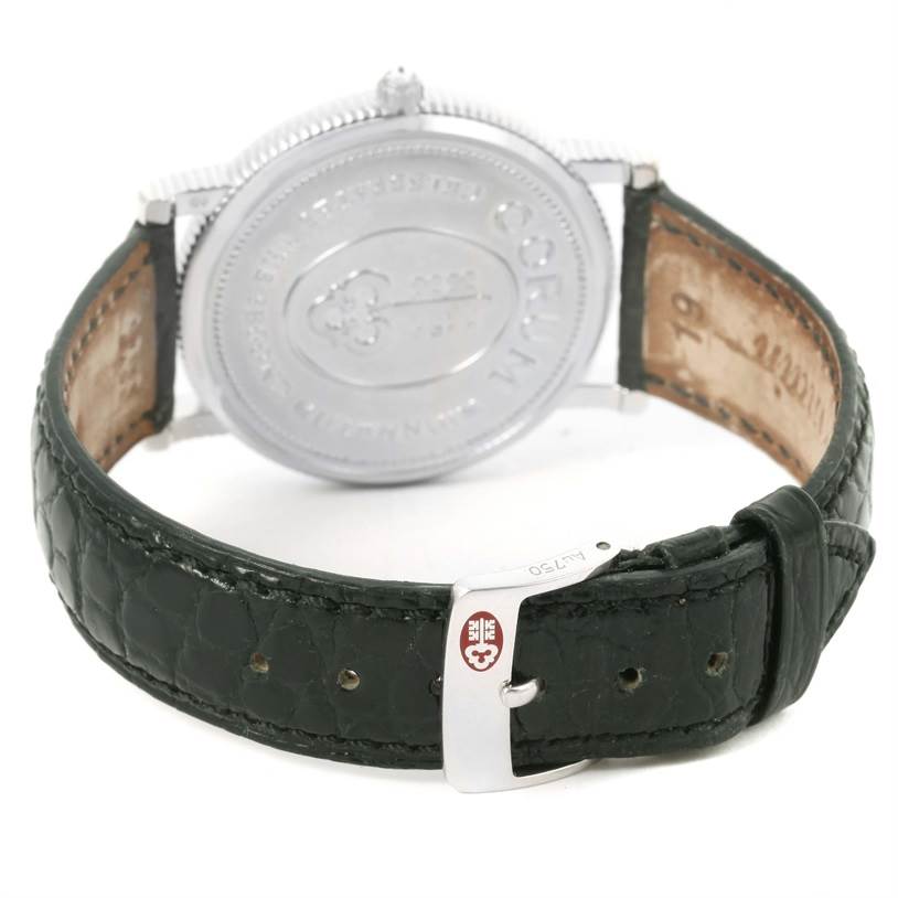 The image shows the back and band of the Corum Men's White Gold White Dial Men's White Gold White Dial Celebrates Second Millennium 18K White Gold Automatic LTD Watch.