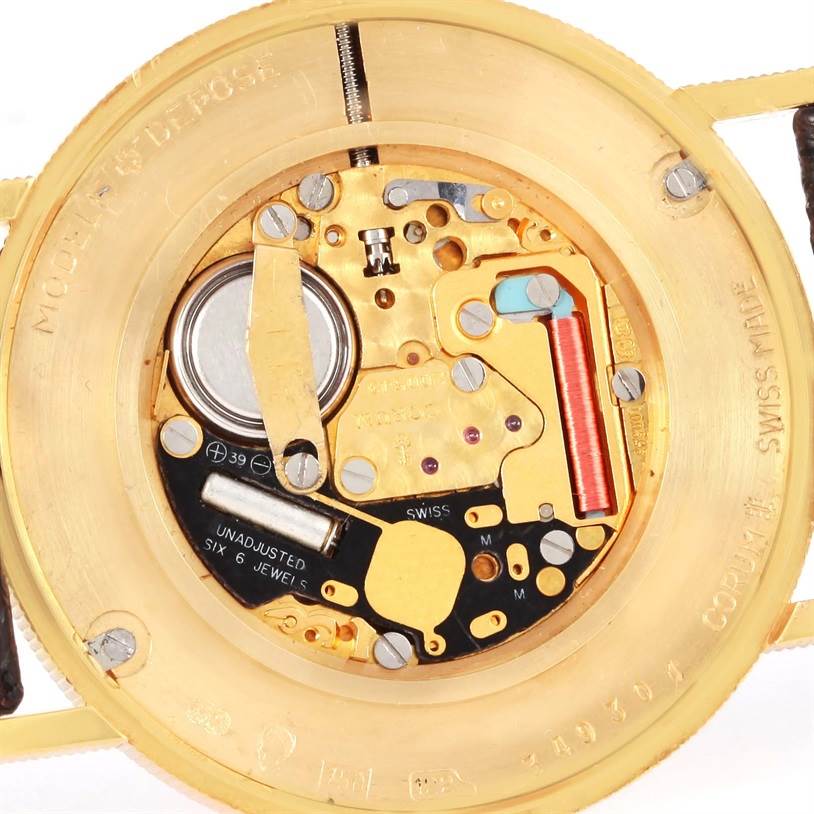 The image shows the internal components of the Corum Coin Watch Men's Yellow Gold Black Dial Men's Yellow Gold Black Dial model, taken from the back with the case back removed.