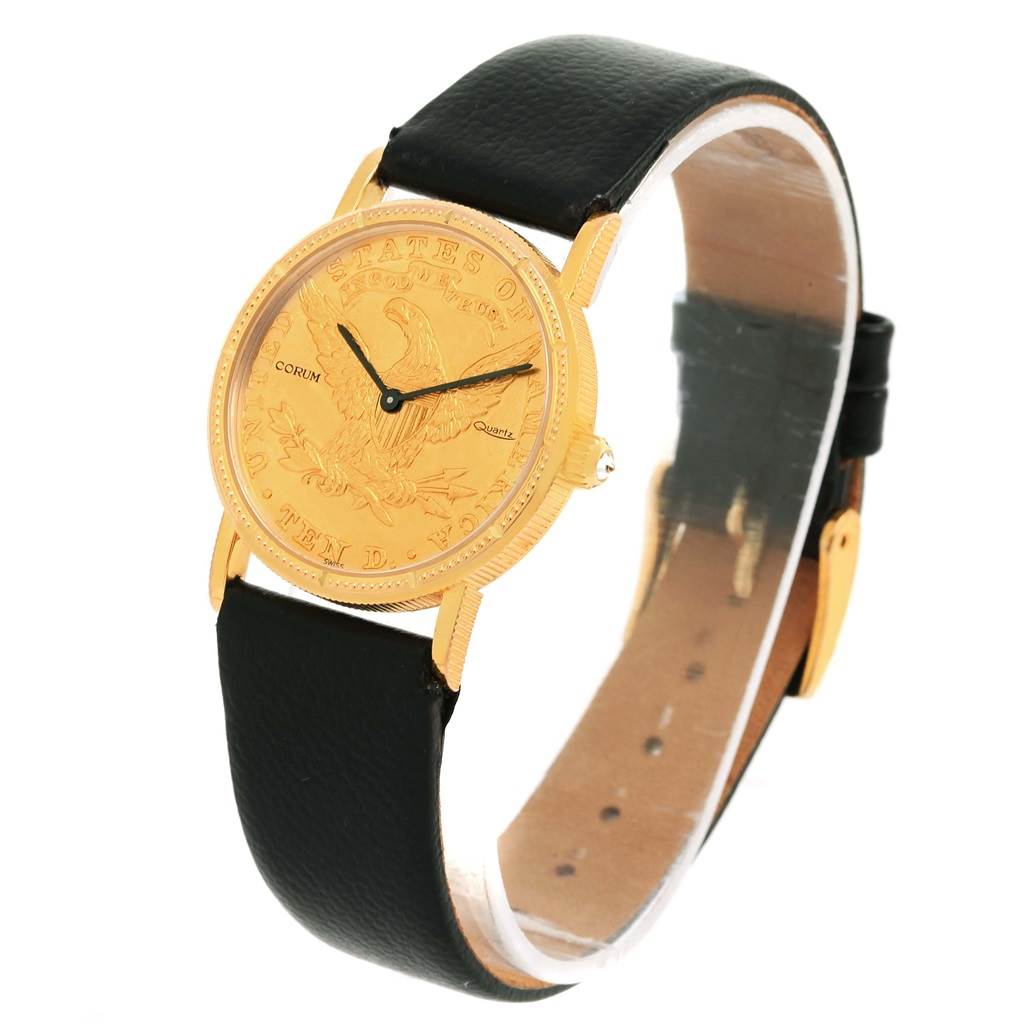 The image shows a side angle of the Corum Women's Yellow Gold Black Dial Women's Yellow Gold Black Dial 18K Yellow Gold 10 Dollars Coin Ladies Watch with a black leather strap.